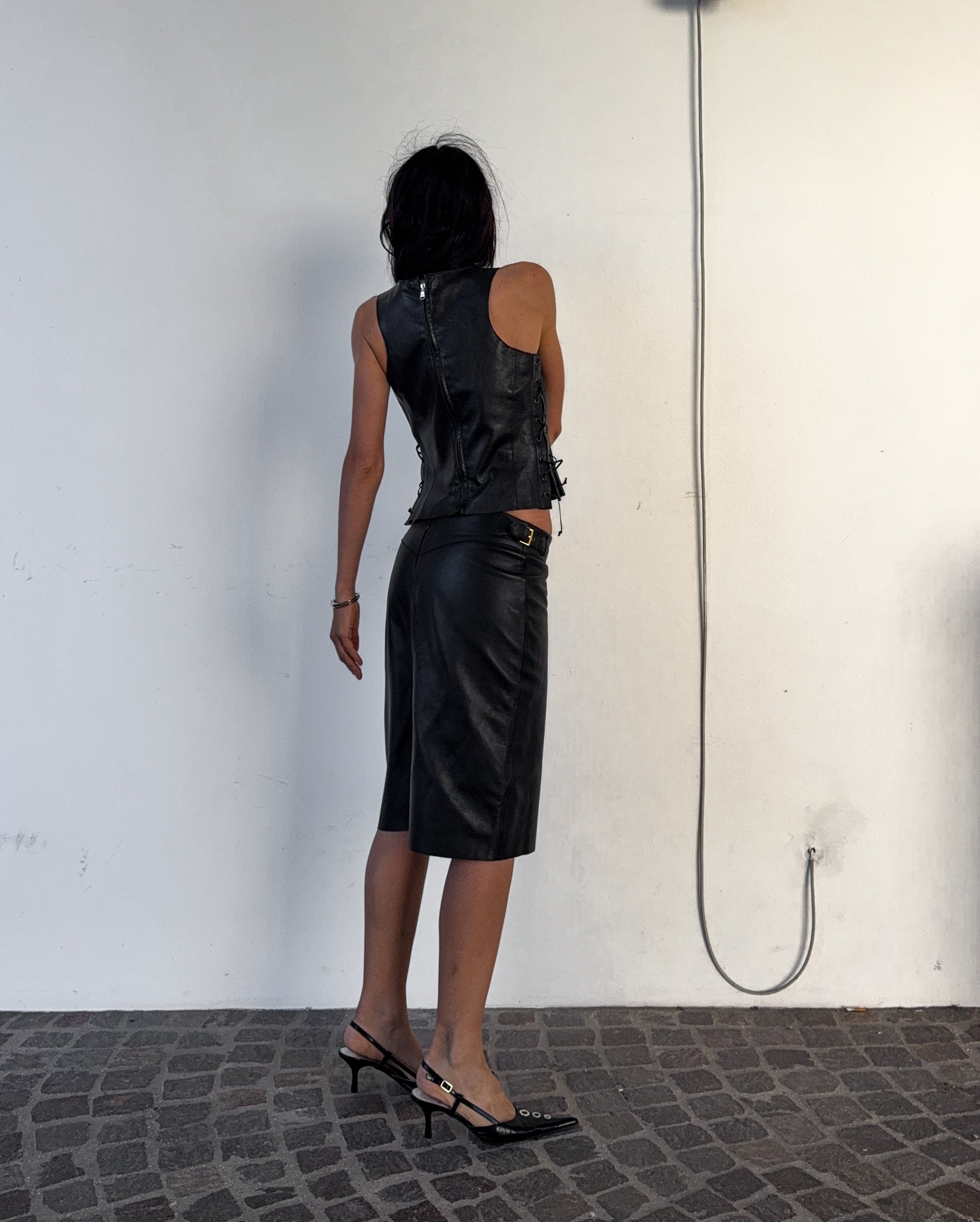 100% leather criss cross top