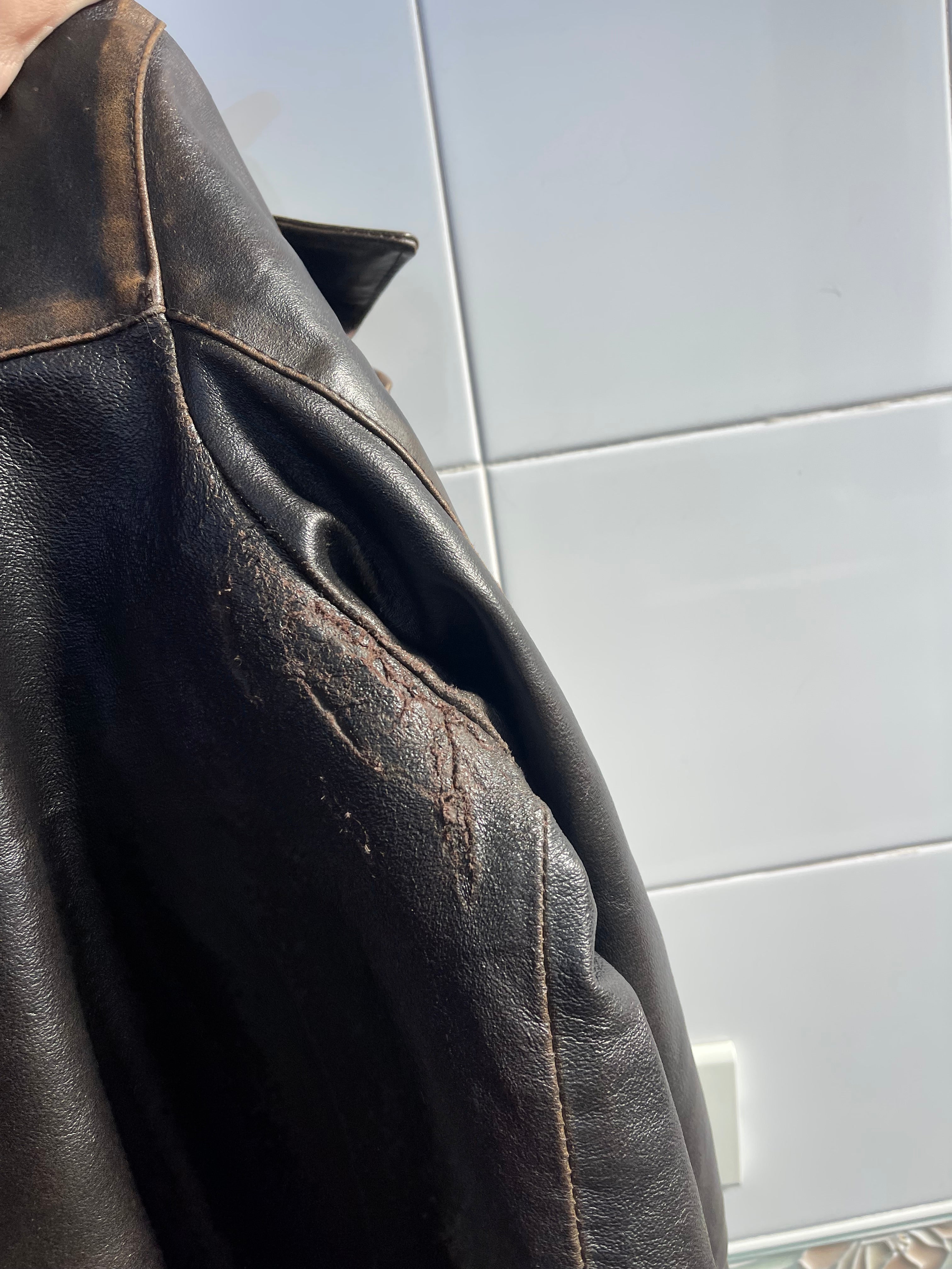 Coated leather jacket*