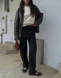 Black wool trousers
