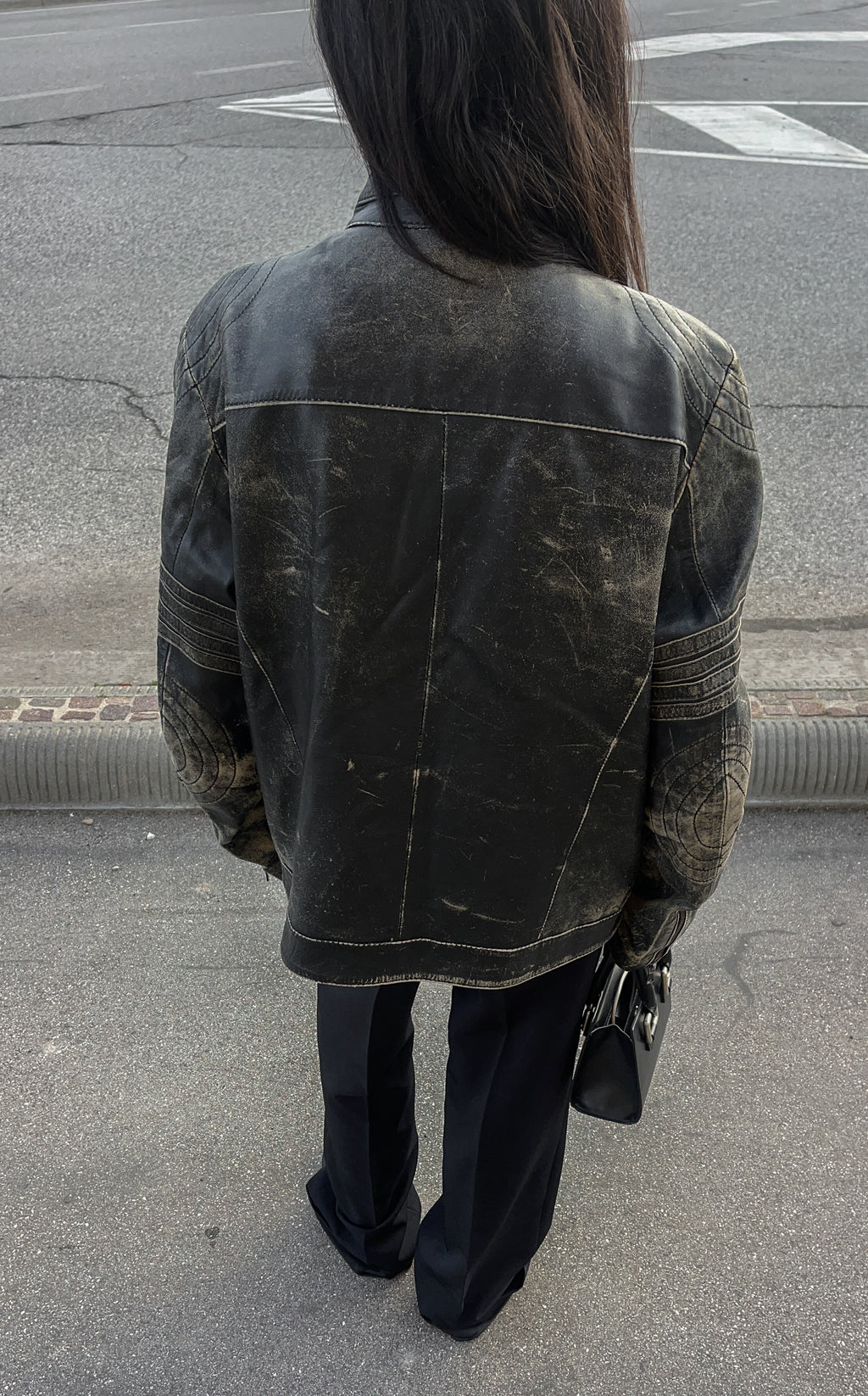 Distressed leather jacket