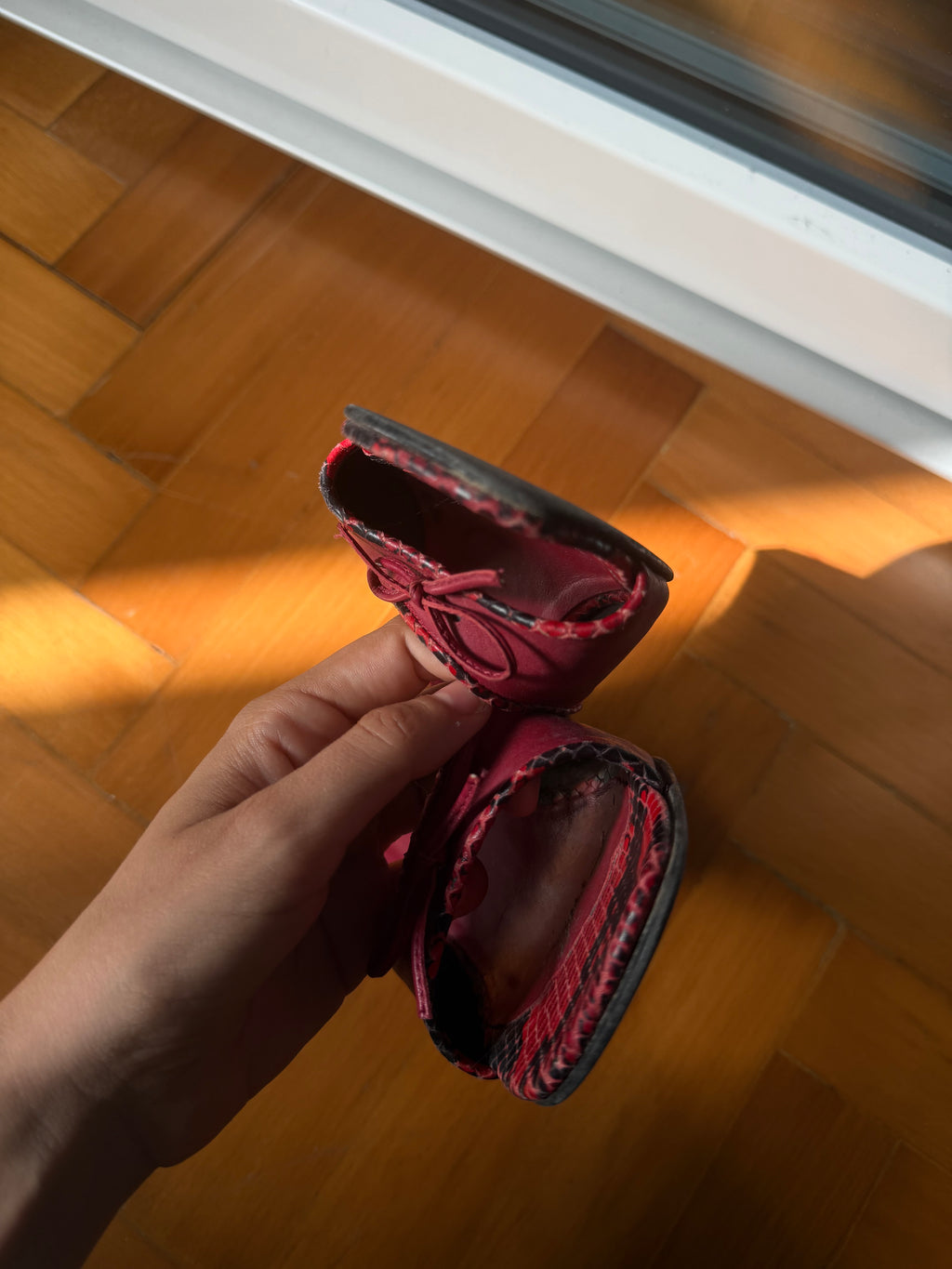 Red fiocchetto mules