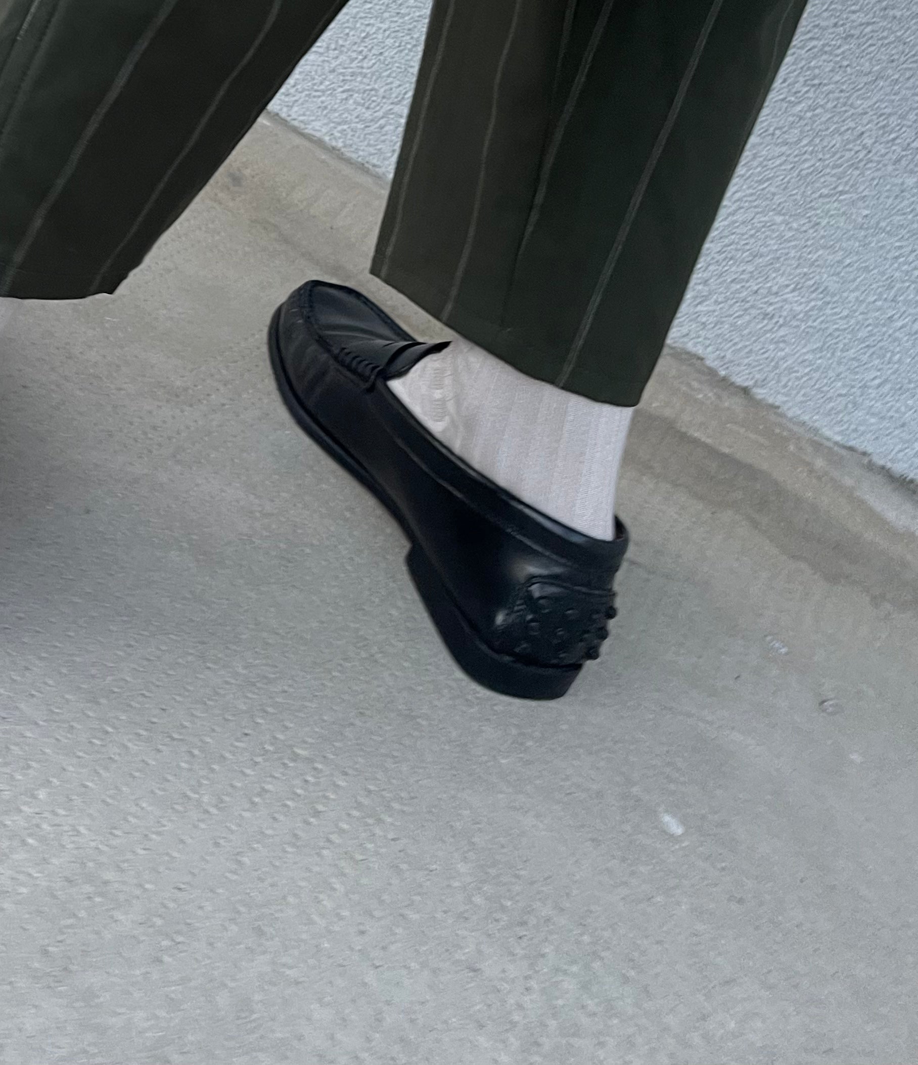 Tod’s black loafers