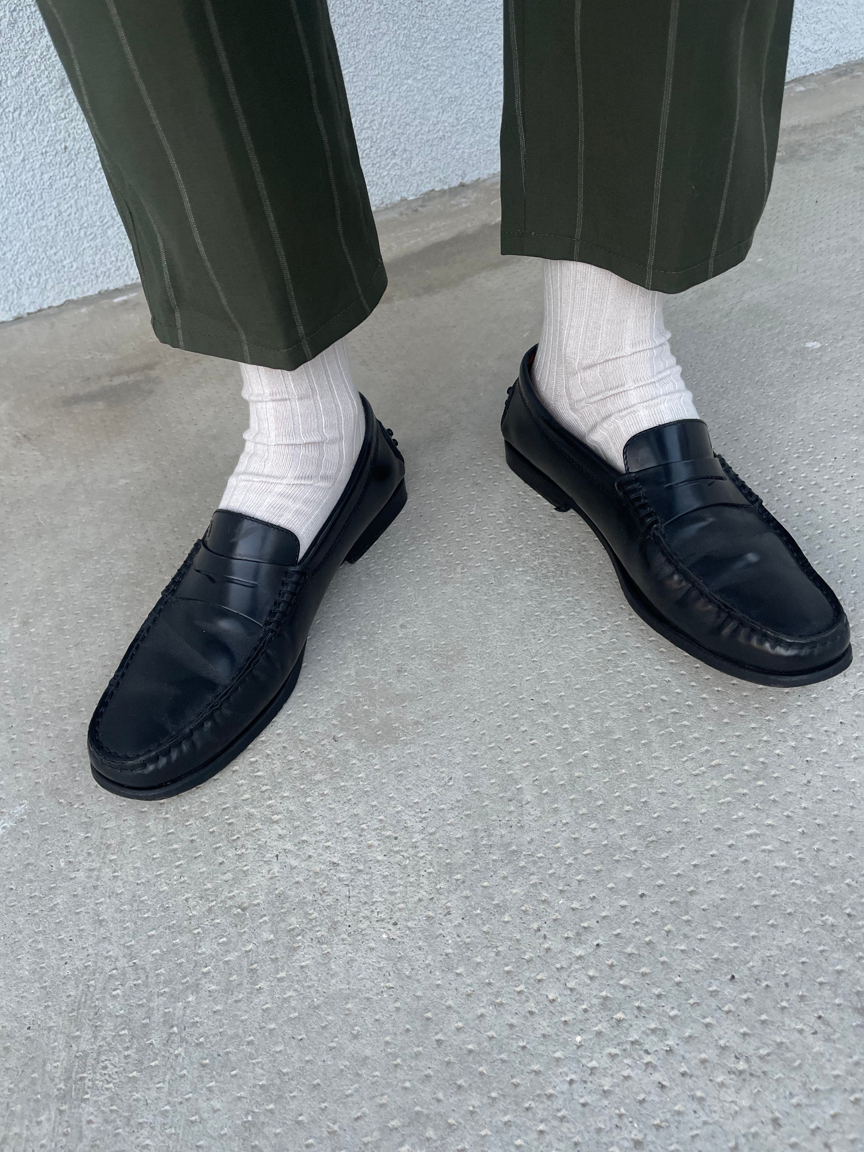 Tod’s black loafers