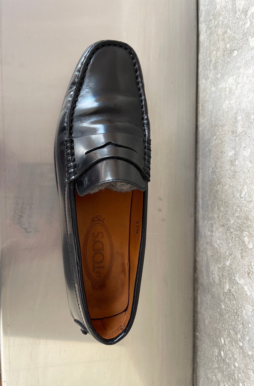 Tod’s black loafers