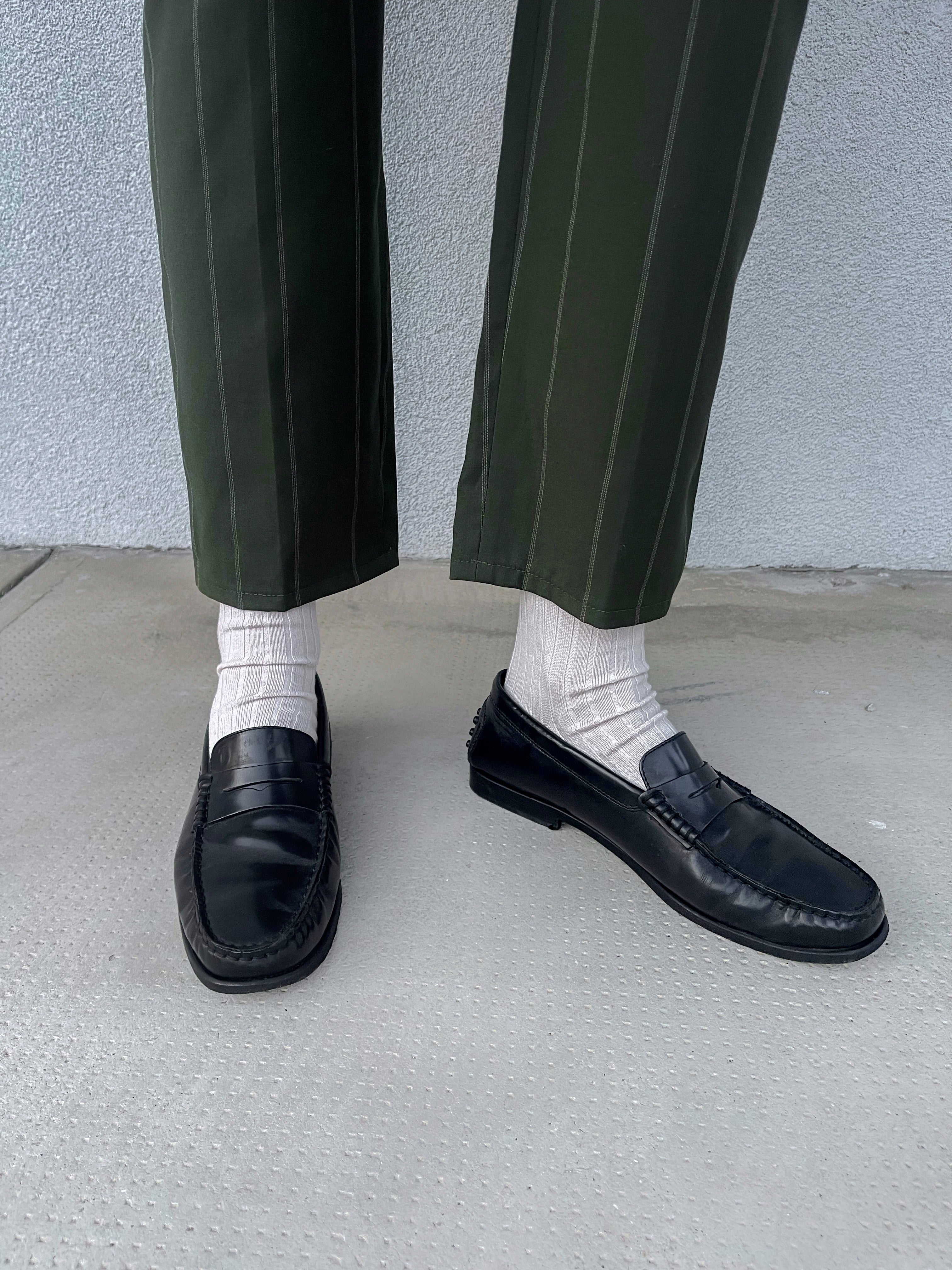 Tod’s black loafers