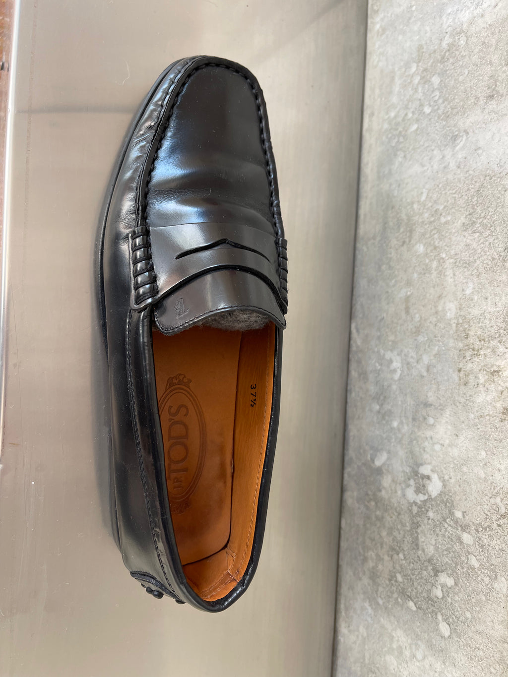 Tod’s black loafers