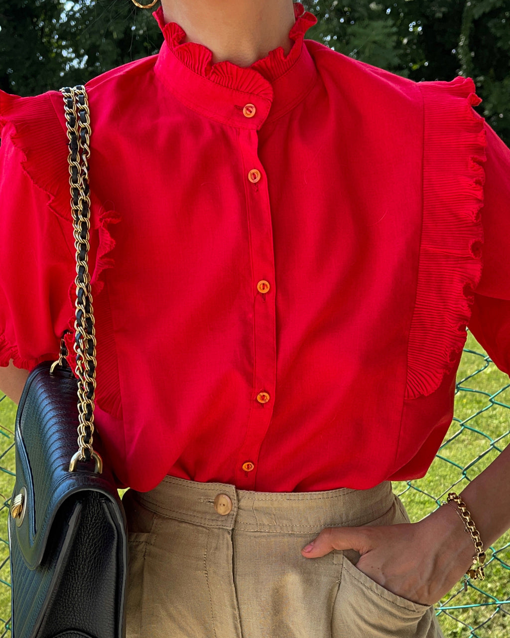 Red ruffle shirt