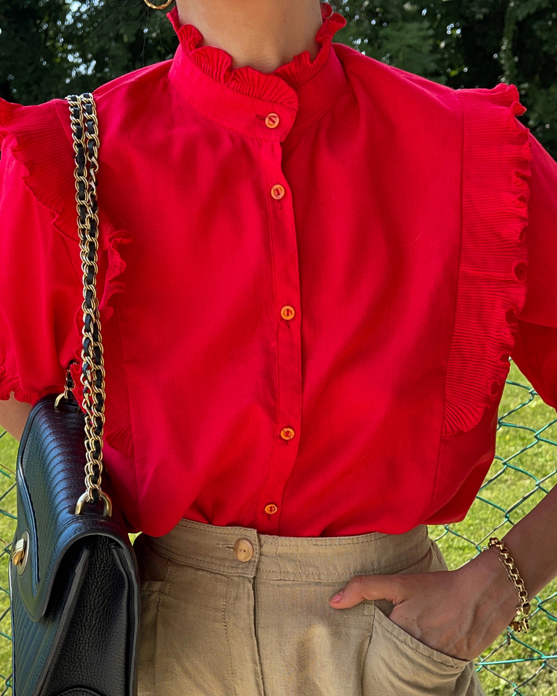 Red ruffle shirt