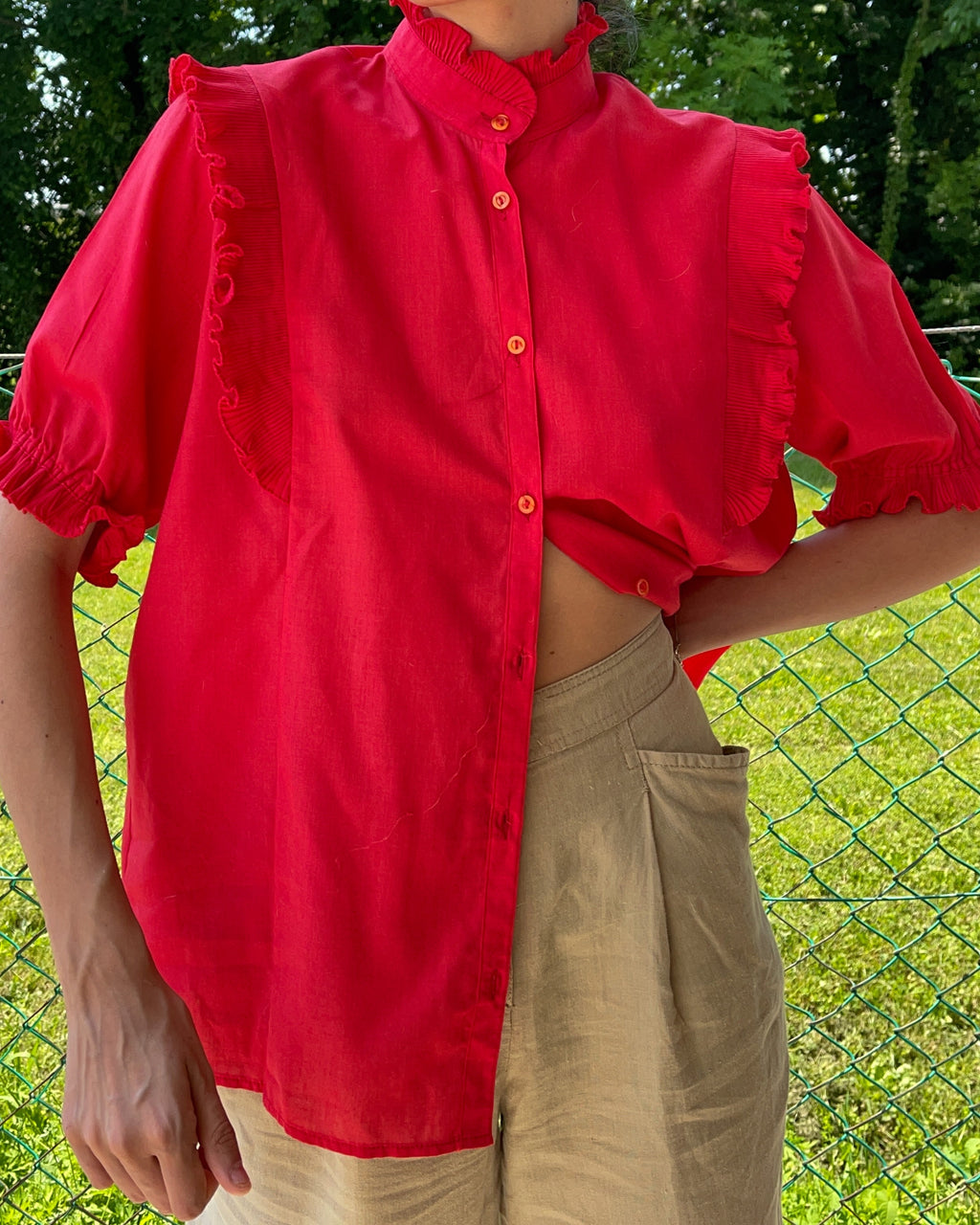 Red ruffle shirt