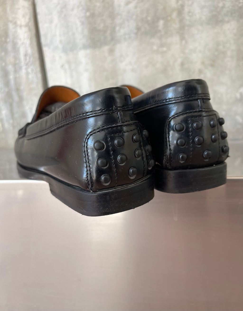 Tod’s black loafers