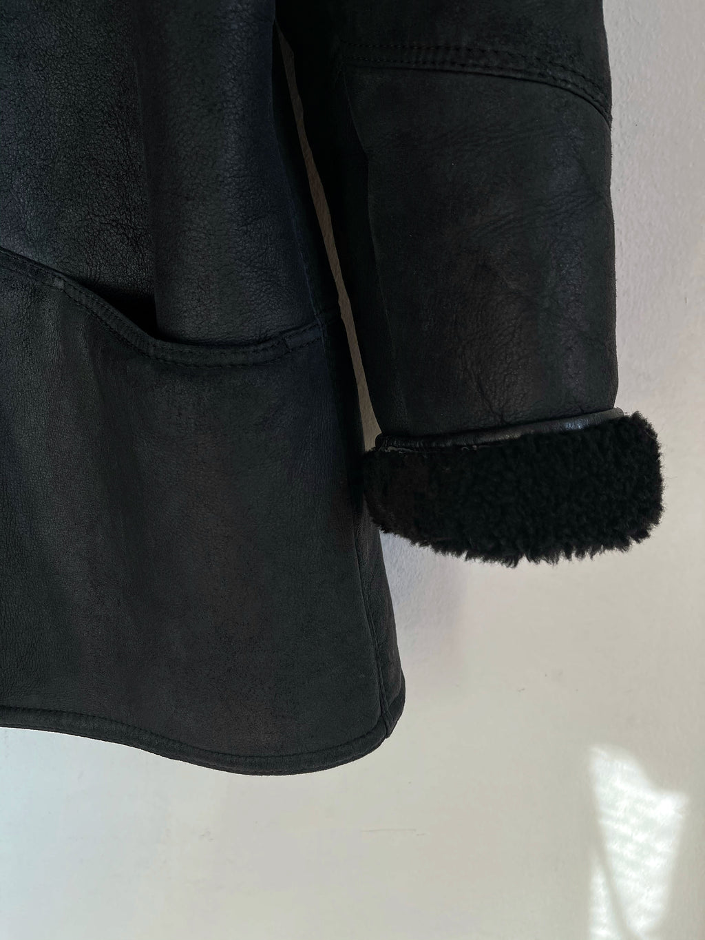 Black shearling coat