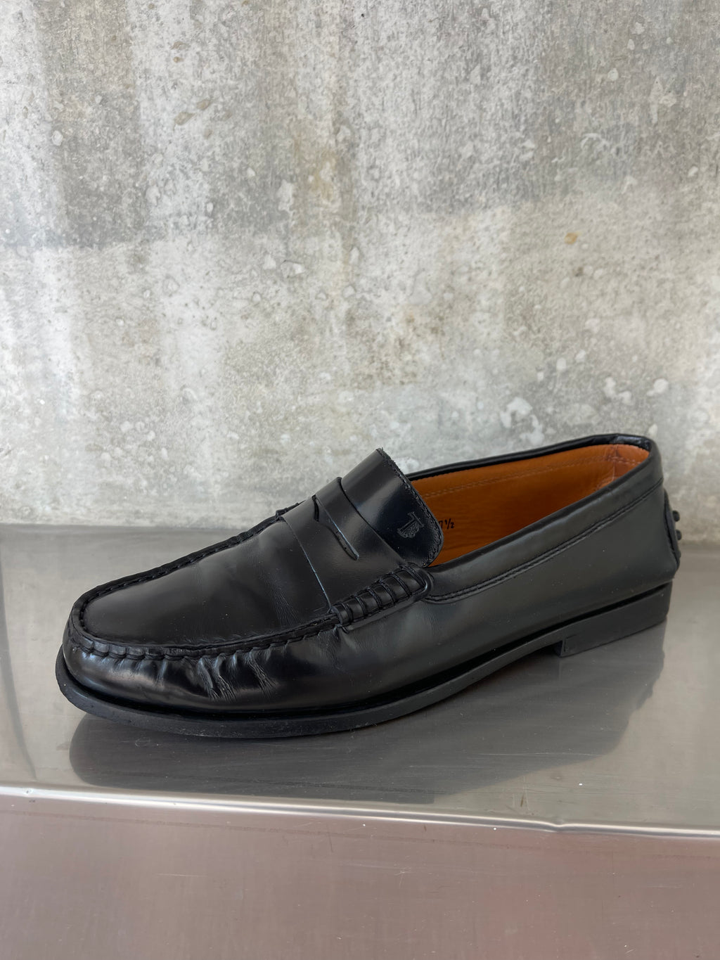 Tod’s black loafers