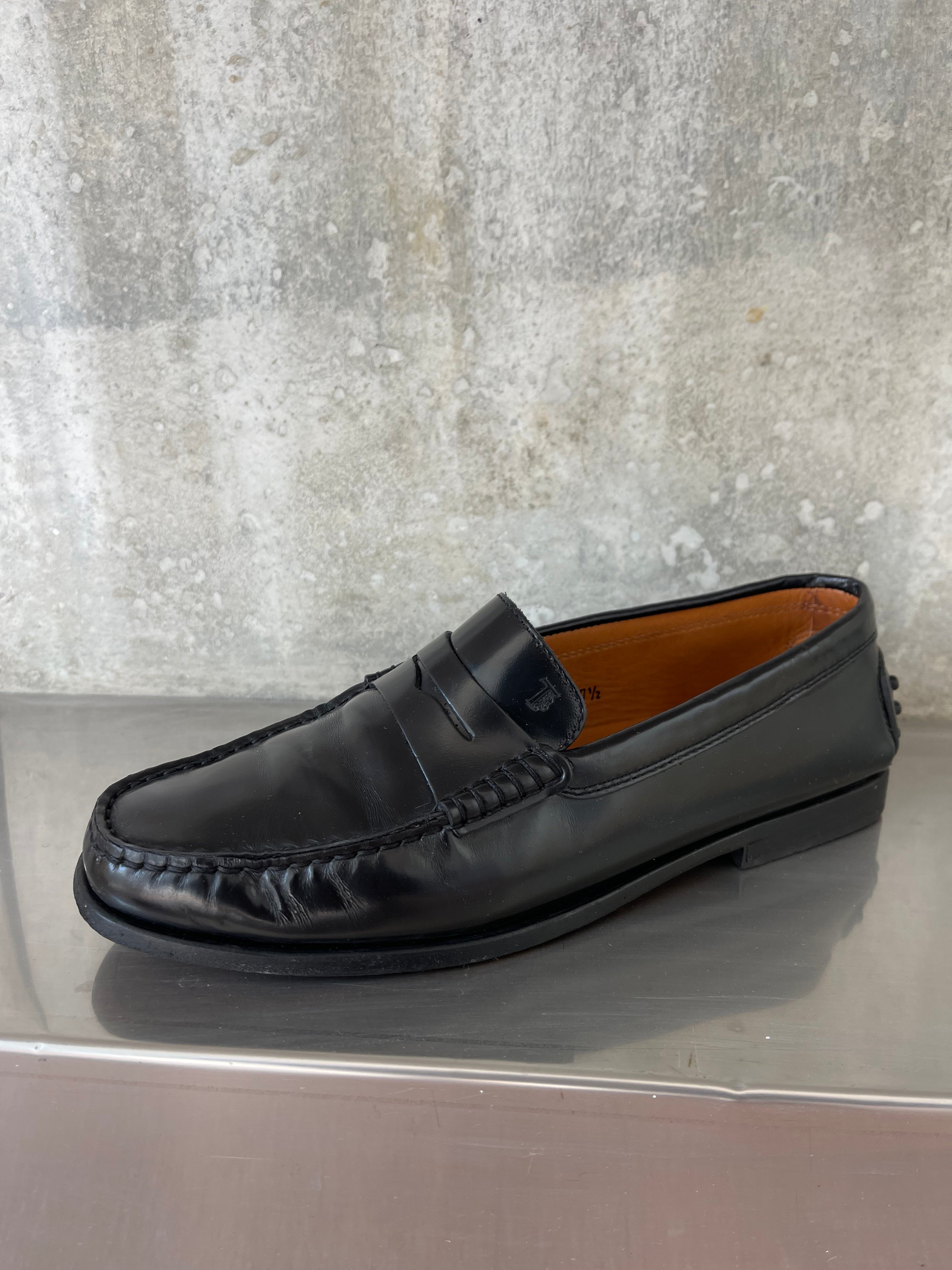Tod’s black loafers
