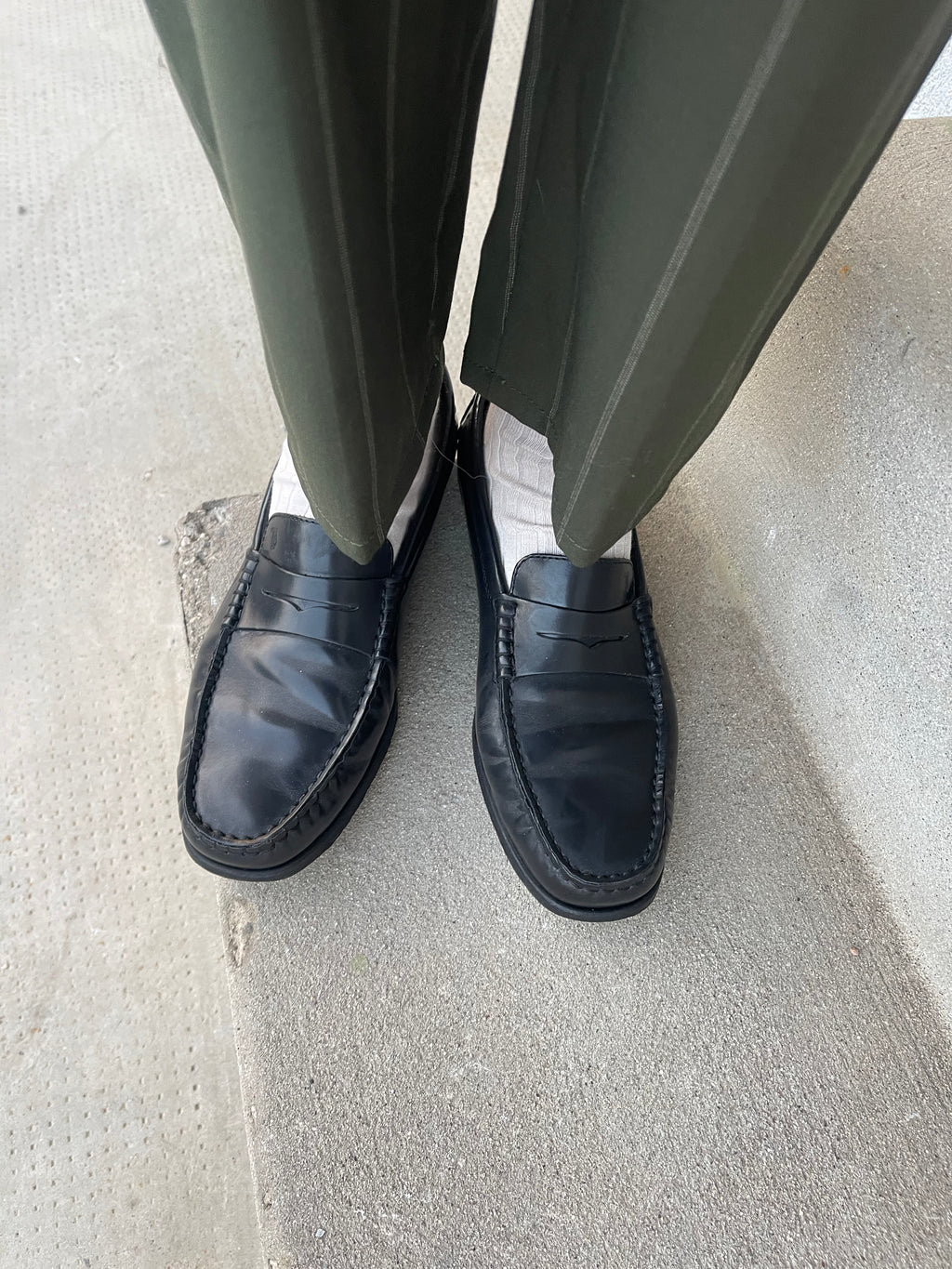 Tod’s black loafers
