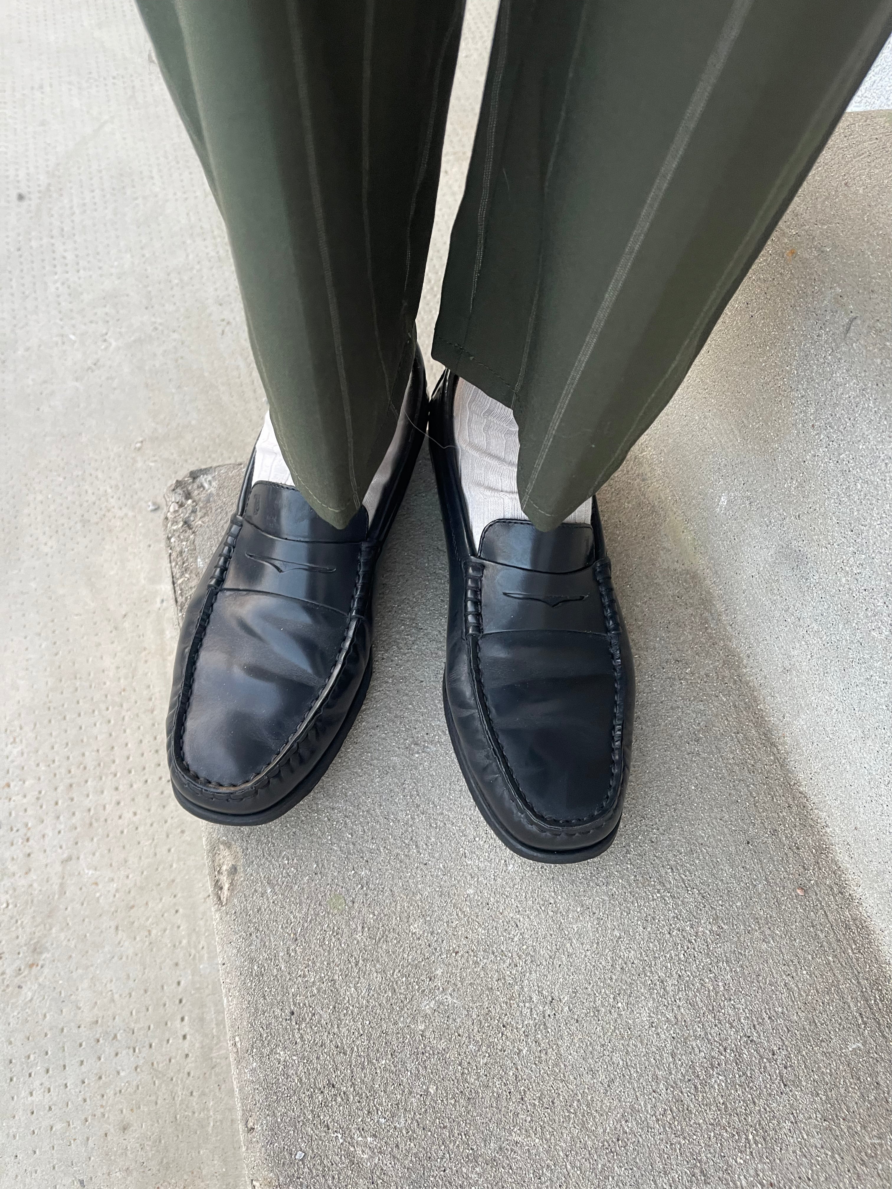 Tod’s black loafers