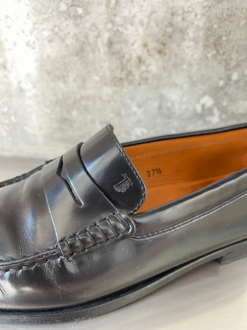 Tod’s black loafers