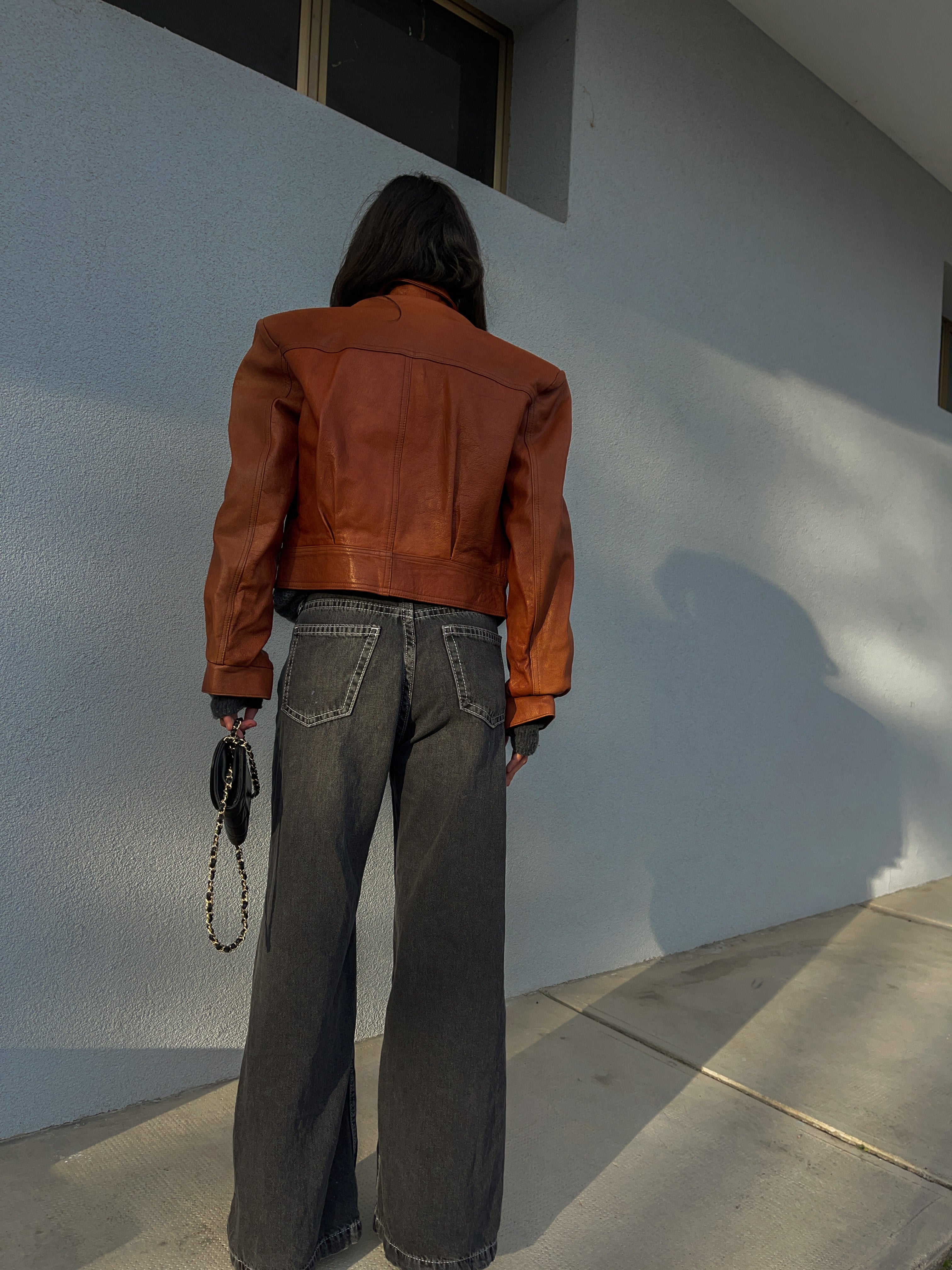 Cropped cognac leather jacket